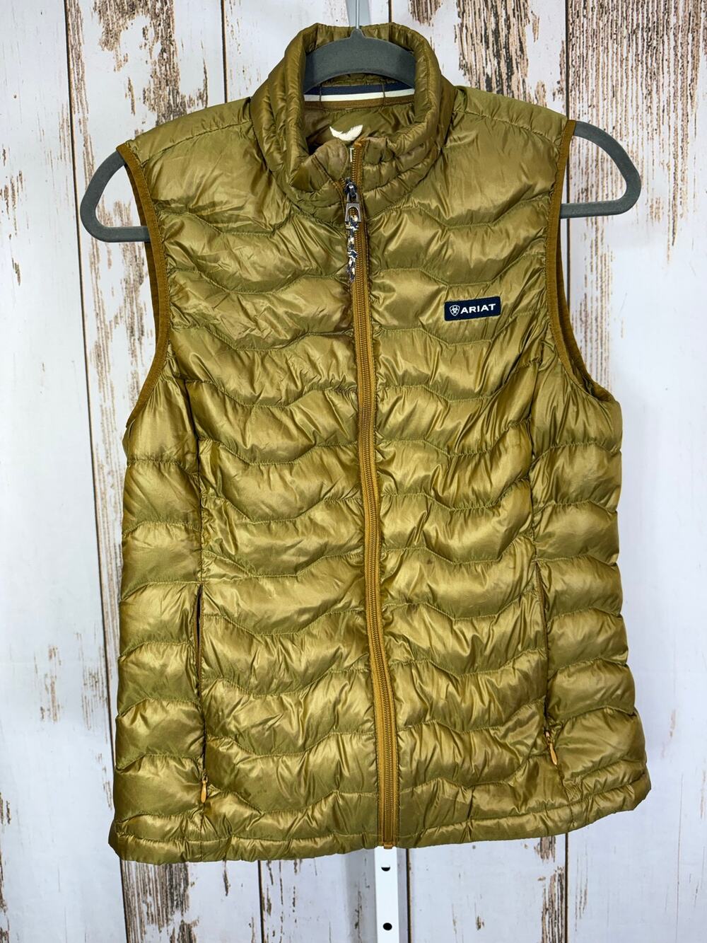 Ariat, Ideal Down, Goldish Green Puffer Vest. Size Medium. Good used condition!